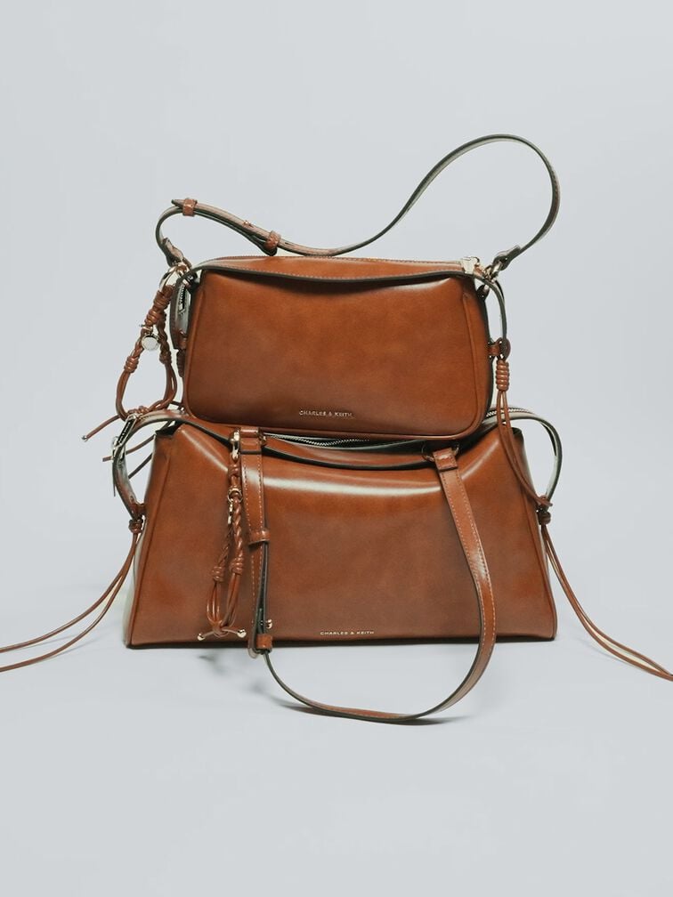 T&uacute;i đeo vai h&igrave;nh thang Haylen Braided-Charm, Distressed Tan, hi-res