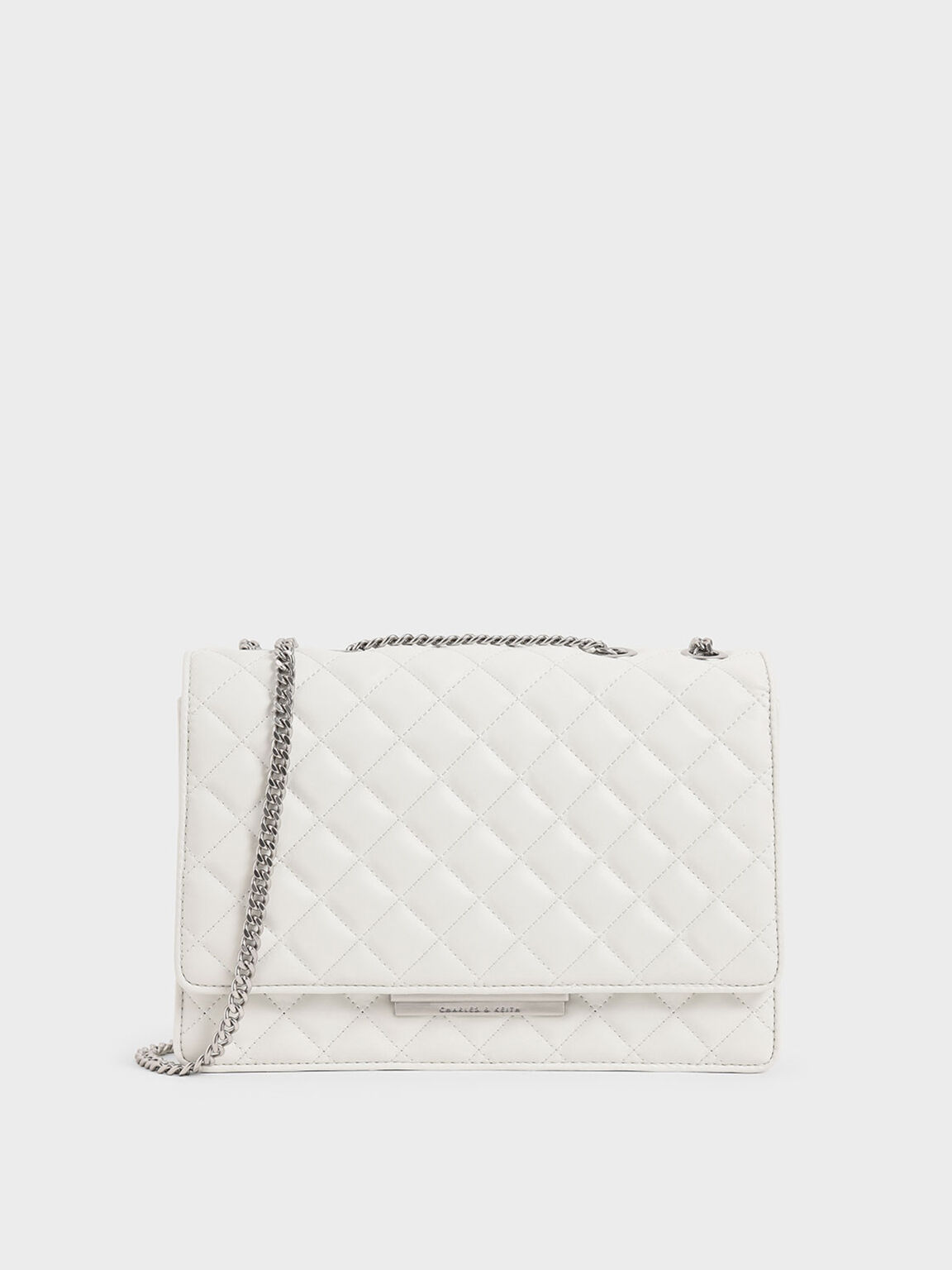 River Island quilted cross body bag with chain strap in white | ASOS