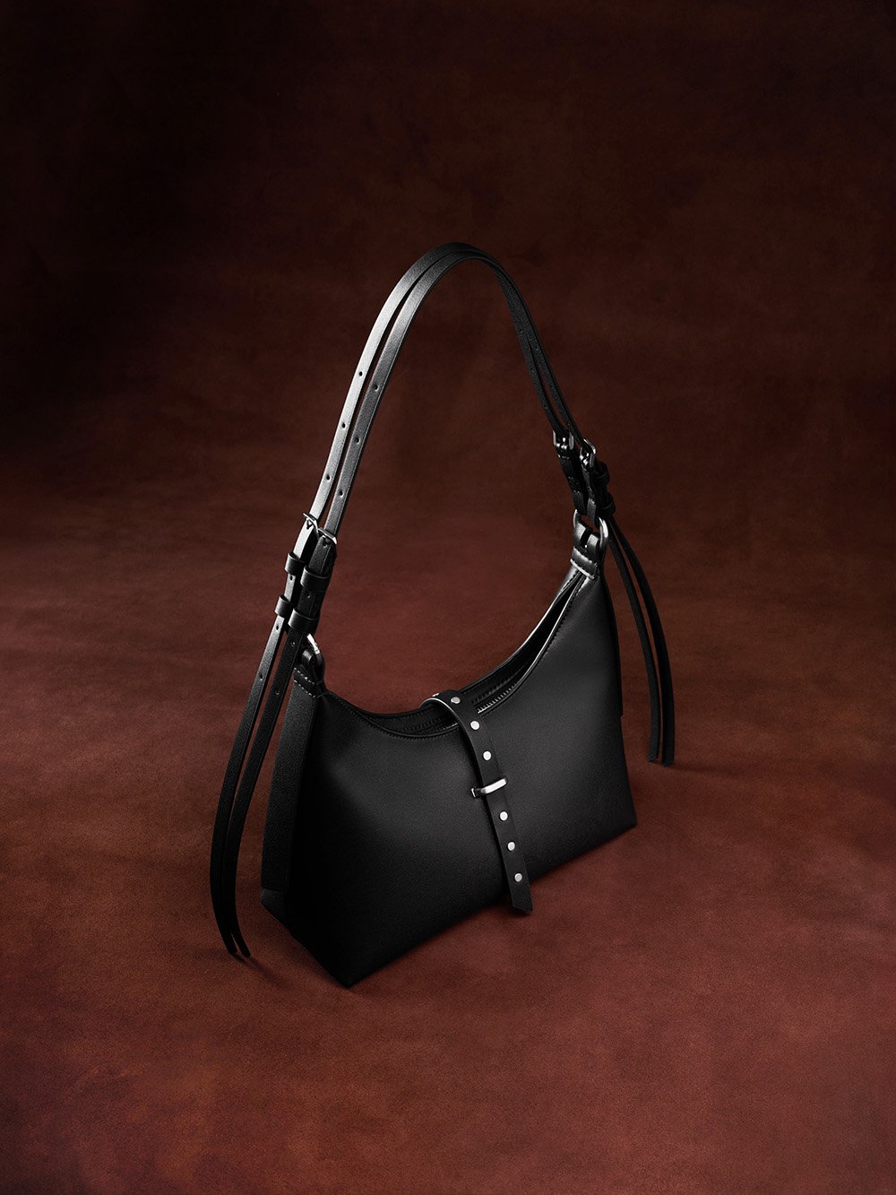 Women’s Lark studded belted shoulder bag in noir - CHARLES & KEITH