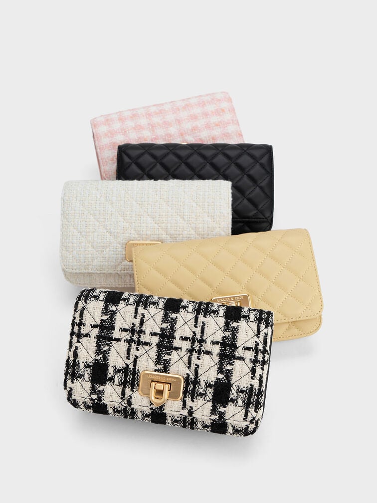 Clutches with a compact, handheld design, suitable for formal occasions.  