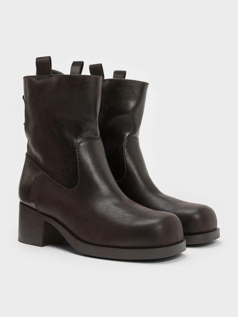 Cool-toned dark brown ankle boots with back lacing.