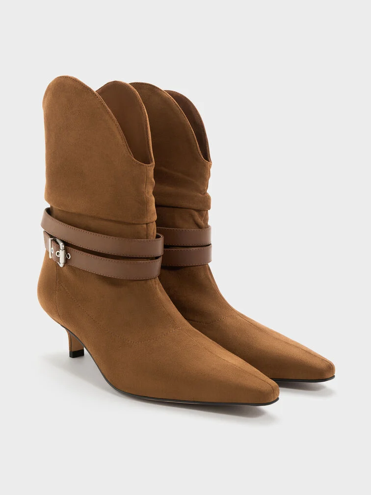 Faux suede platform knee-high boots featuring a warm cognac brown finish.