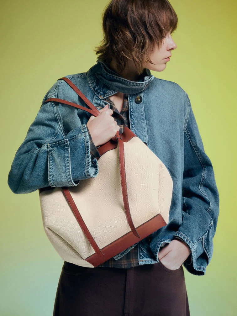 XL slouchy canvas tote bag offers plenty of storage space for daily essentials.