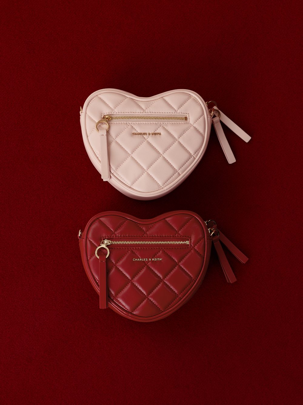 Women’s soft pink and tomato red Paffuto quilted heart chain-strap crossbody bag - CHARLES & KEITH