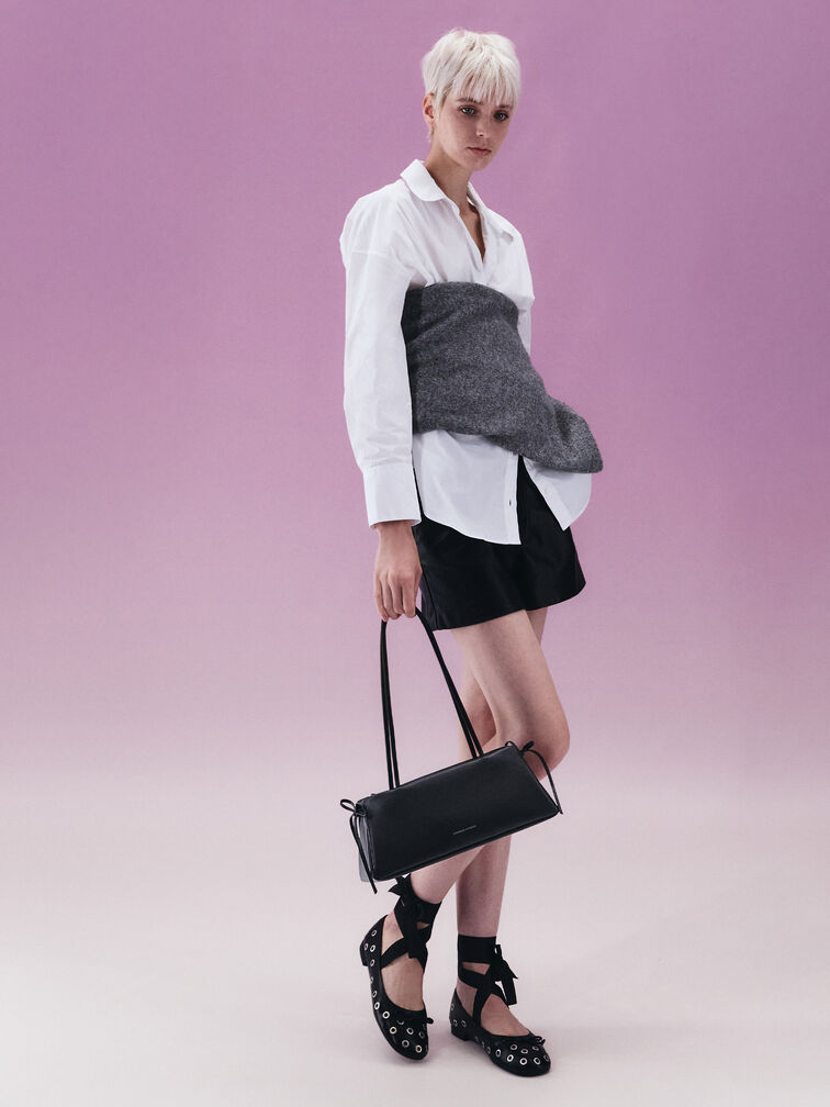 East-West bags with bow details exude a playful vibe, perfect for casual off-duty days.