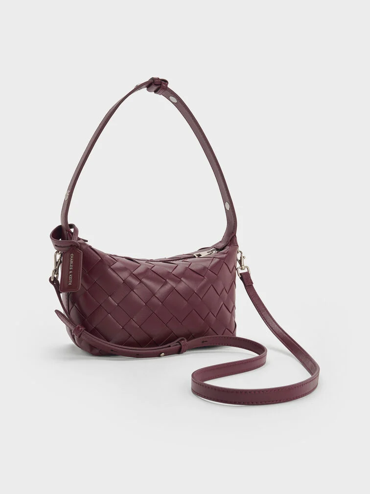 Wineberry red woven shoulder bag, an effortless finishing touch to a casual wedding-guest look. 